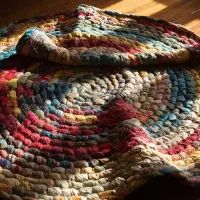 Плетеный коврик