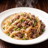 Тушеная капуста с фаршем и горошком